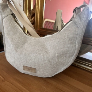 Demi-lune beige sable